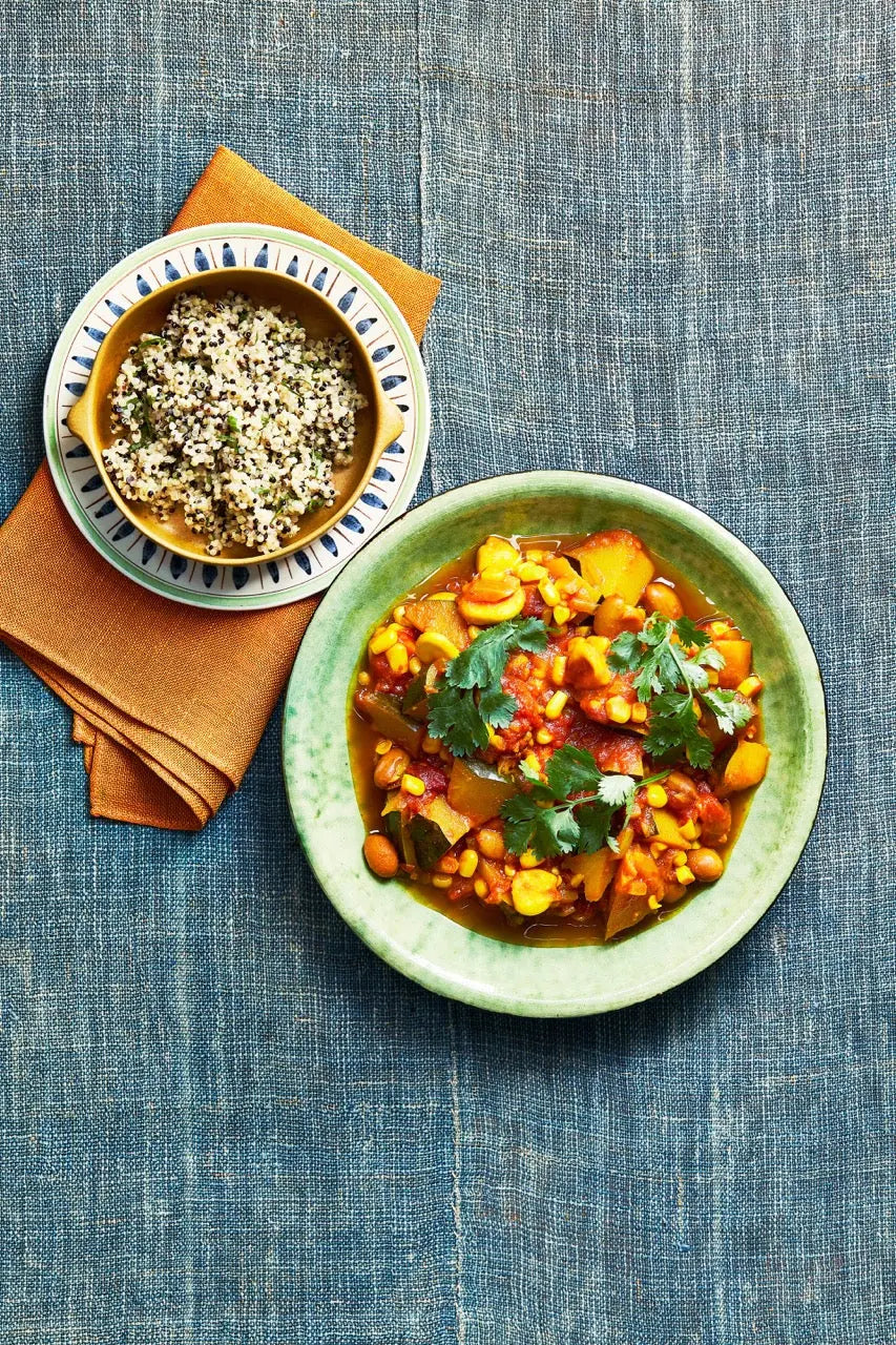 A plate with corn, bean & squash stew for upcoming menu provided by Laroot World, an organic, local, gluten free New York City flexitarian, pescatarian, carnitarian, vegan, and vegetarian meal delivery service 
