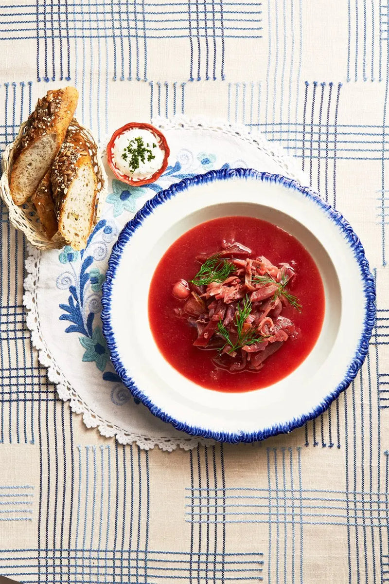 A bowl of classic beet soup for upcoming menu provided by Laroot World, an organic, local, gluten free New York City flexitarian, pescatarian, carnitarian, vegan, and vegetarian meal delivery service 